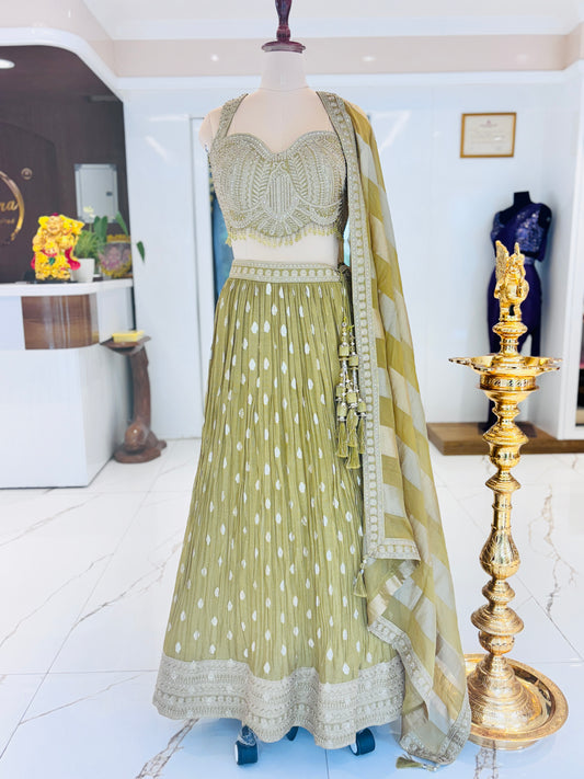 Elaichi green flowy Lehenga from Meshira.