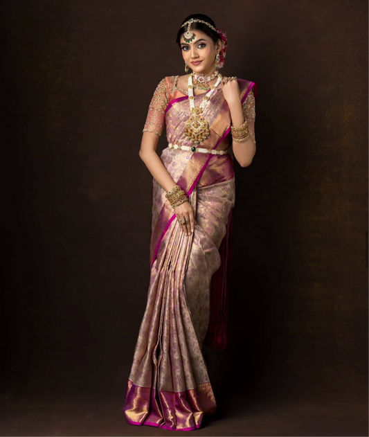 Bridal Kanchivaram silk saree in lavender and pink hues.