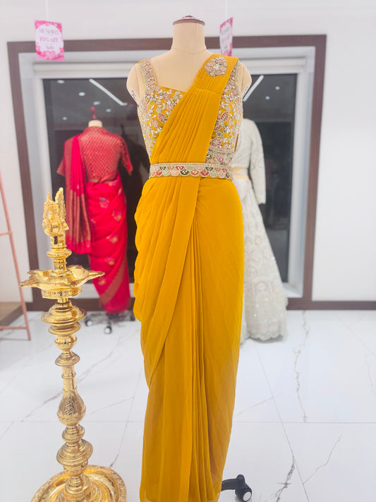 Yellow ready-made sari with embroidered blouse and belt