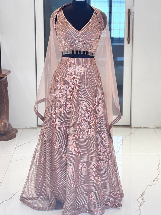 Blush pink sequence lehenga from Meshira.