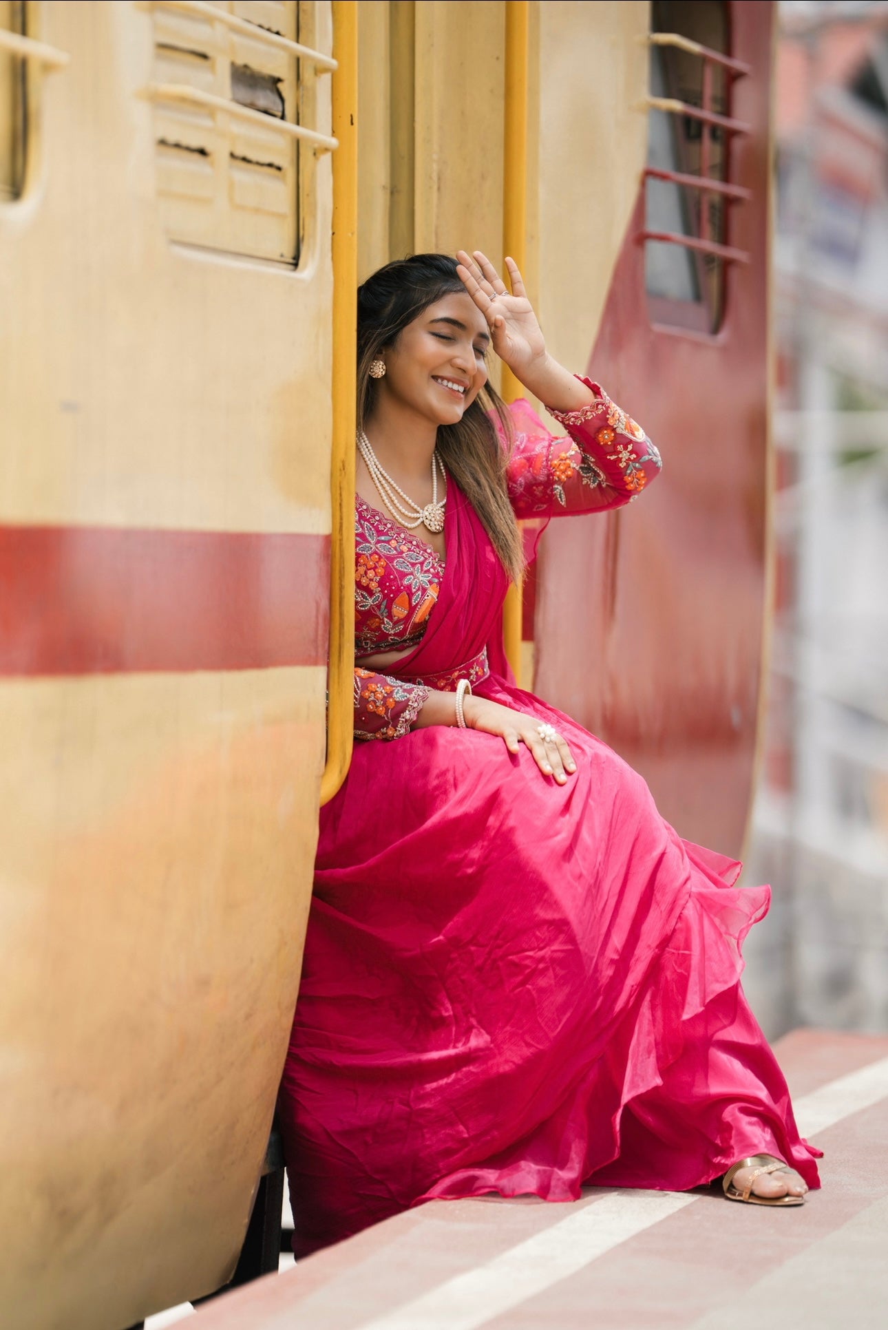 Fuchsia pink designer drape saree with belt