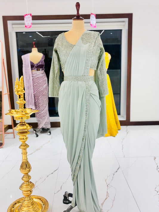 Mint green ready made Saree with embellished blouse