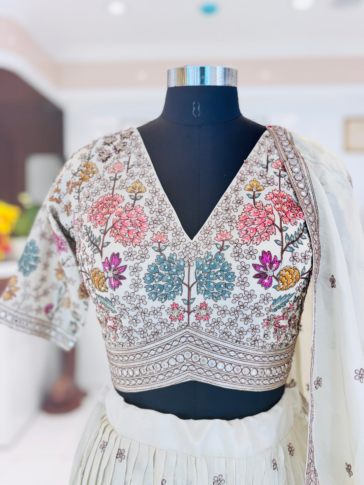 A dreamy lehenga adorned with delicate floral embroidery.