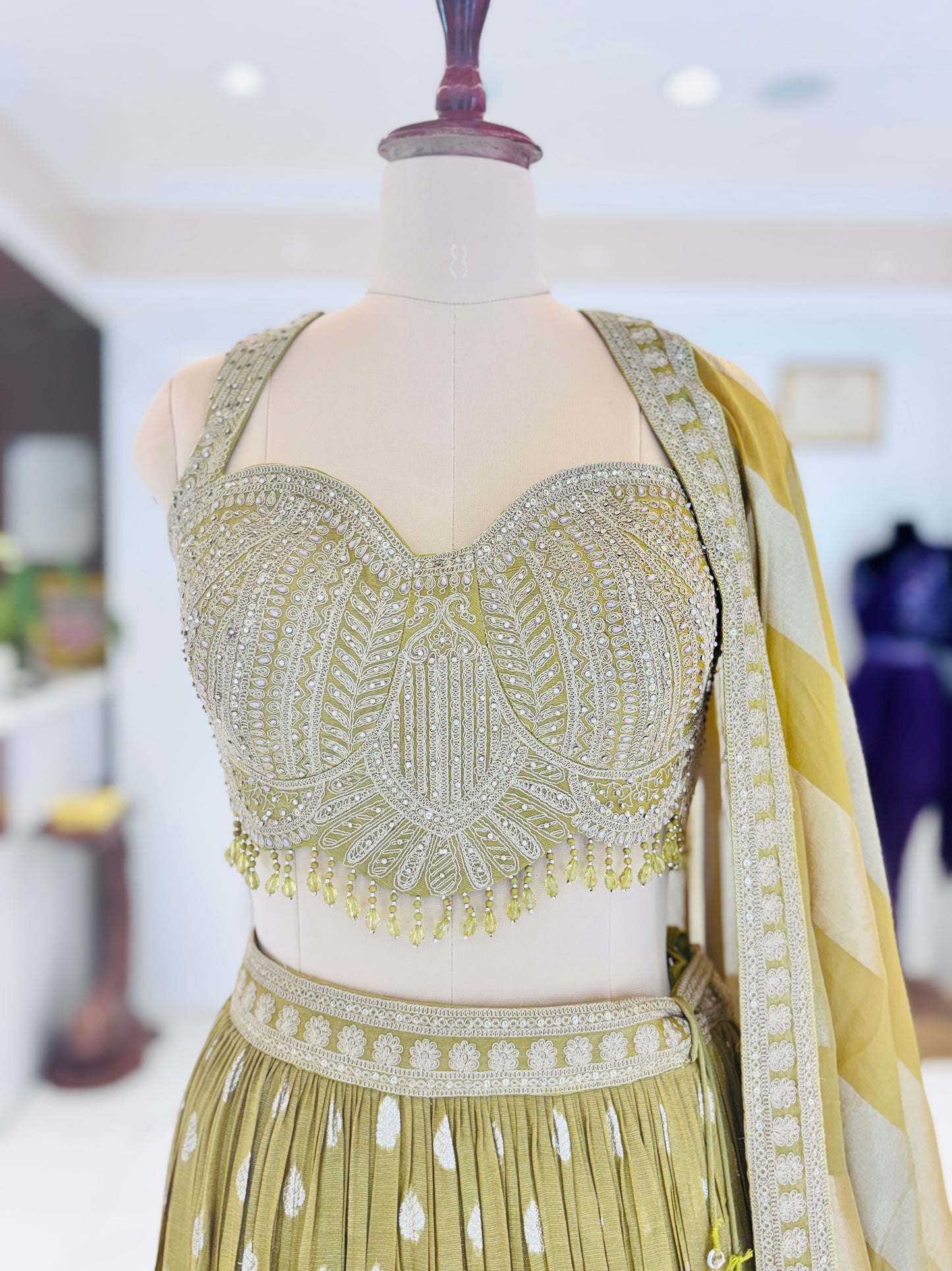 Elaichi green flowy Lehenga from Meshira.