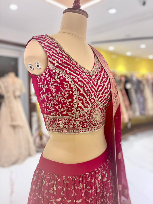 Red designer lehenga from Meshira