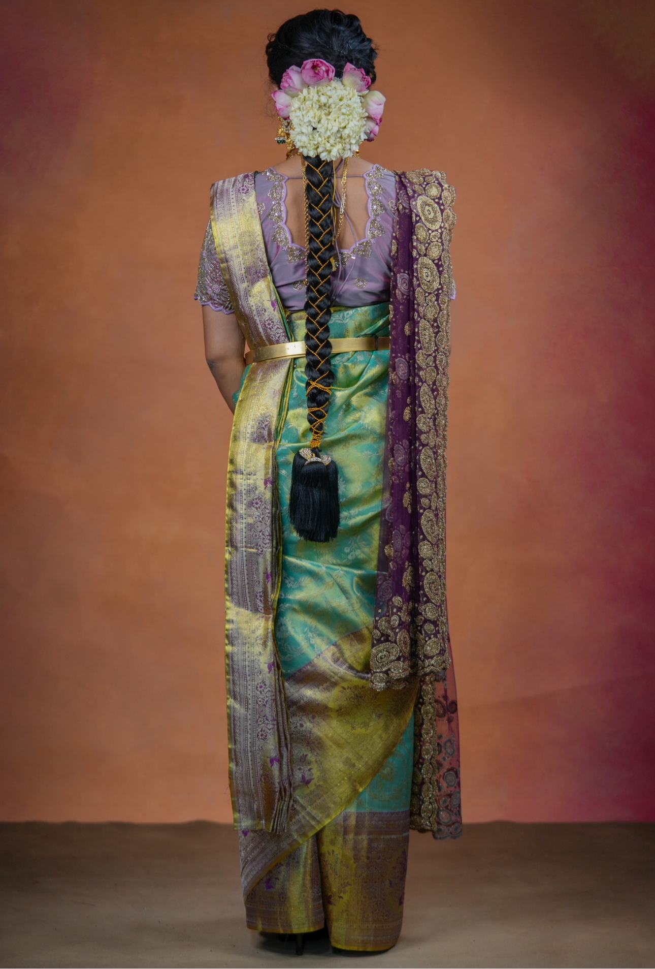 Turquoise blue Kanchivaram Silk Saree with brocade body and blouse.