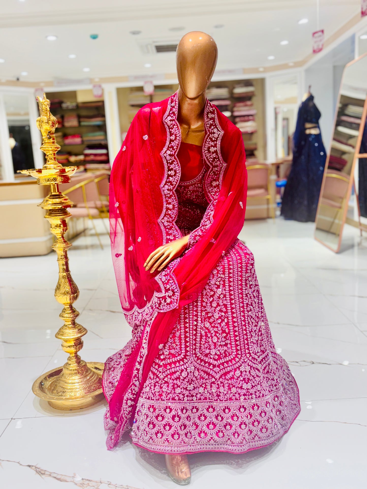 Rani pink bridal embroidered lehengas