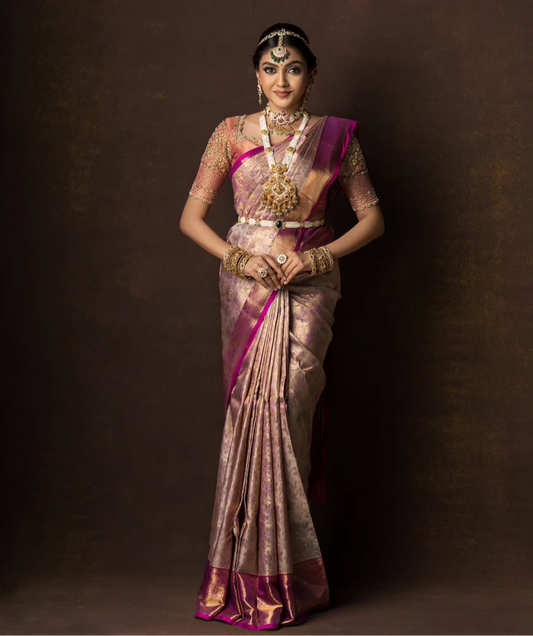 Bridal Kanchivaram silk saree in lavender and pink hues.