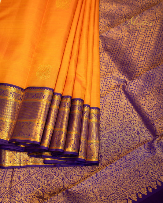 Vibrant Mango Yellow Kanchipuram Silk Saree with Royal Blue and Gold Zari