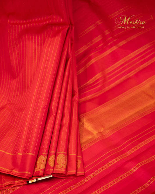 Vermilion Elegance in Kanchivaram Silk with Gold and Zari Accents