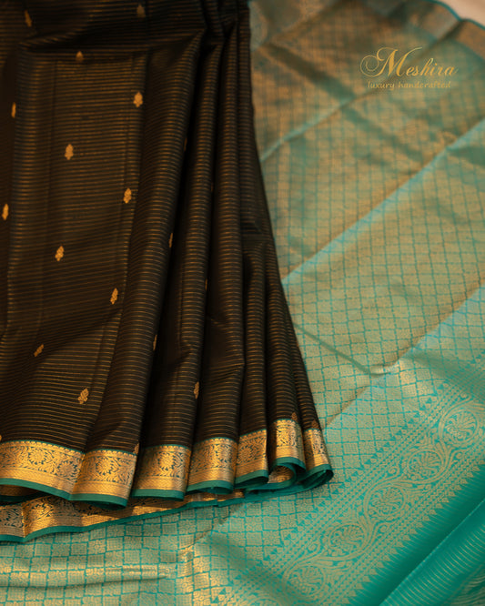 Noir Elegance in Kanchivaram silk saree with Turquoise Zari Brilliance