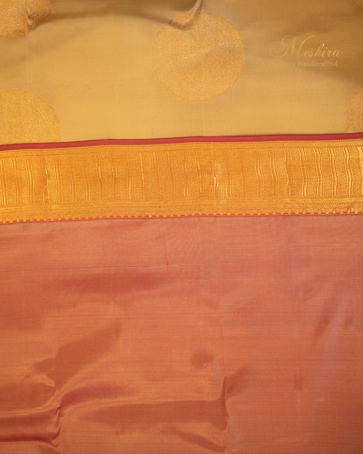 Golden Beige Kanchivaram silk saree with Zari Buttas and Pink Grandeur