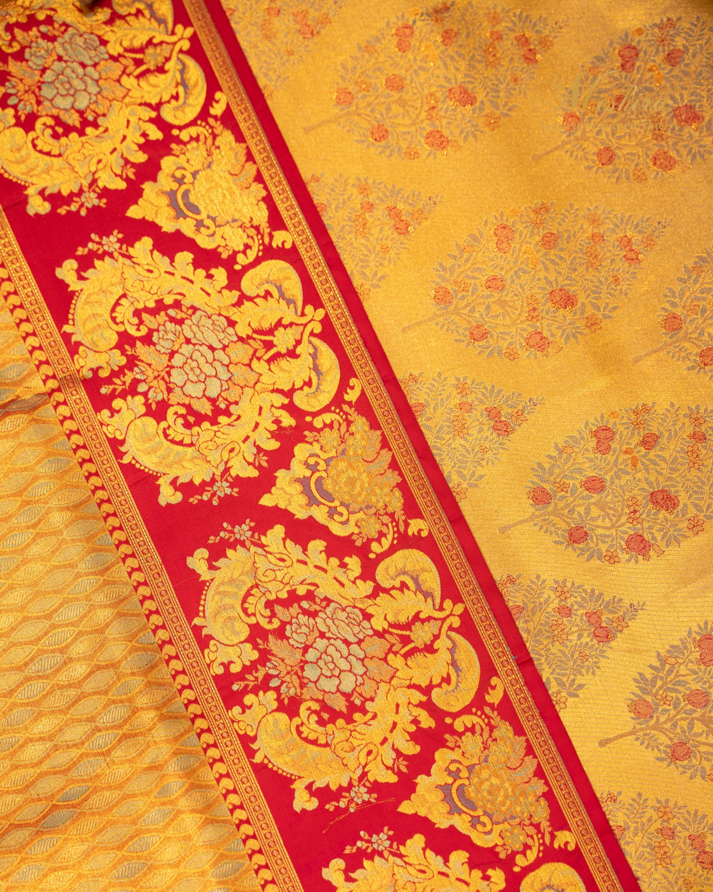 Golden Kanchivaram Silk Saree with Red Brocade and Floral Zari
