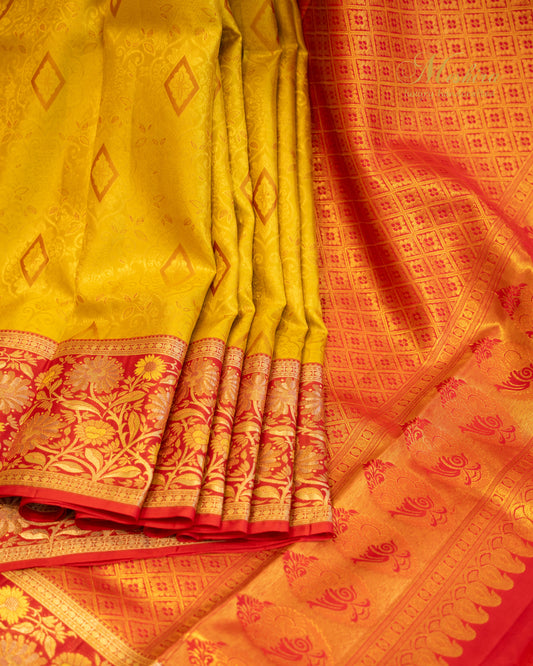 Sunlit Yellow Kanchivaram Silk saree with Coral Zari Elegance