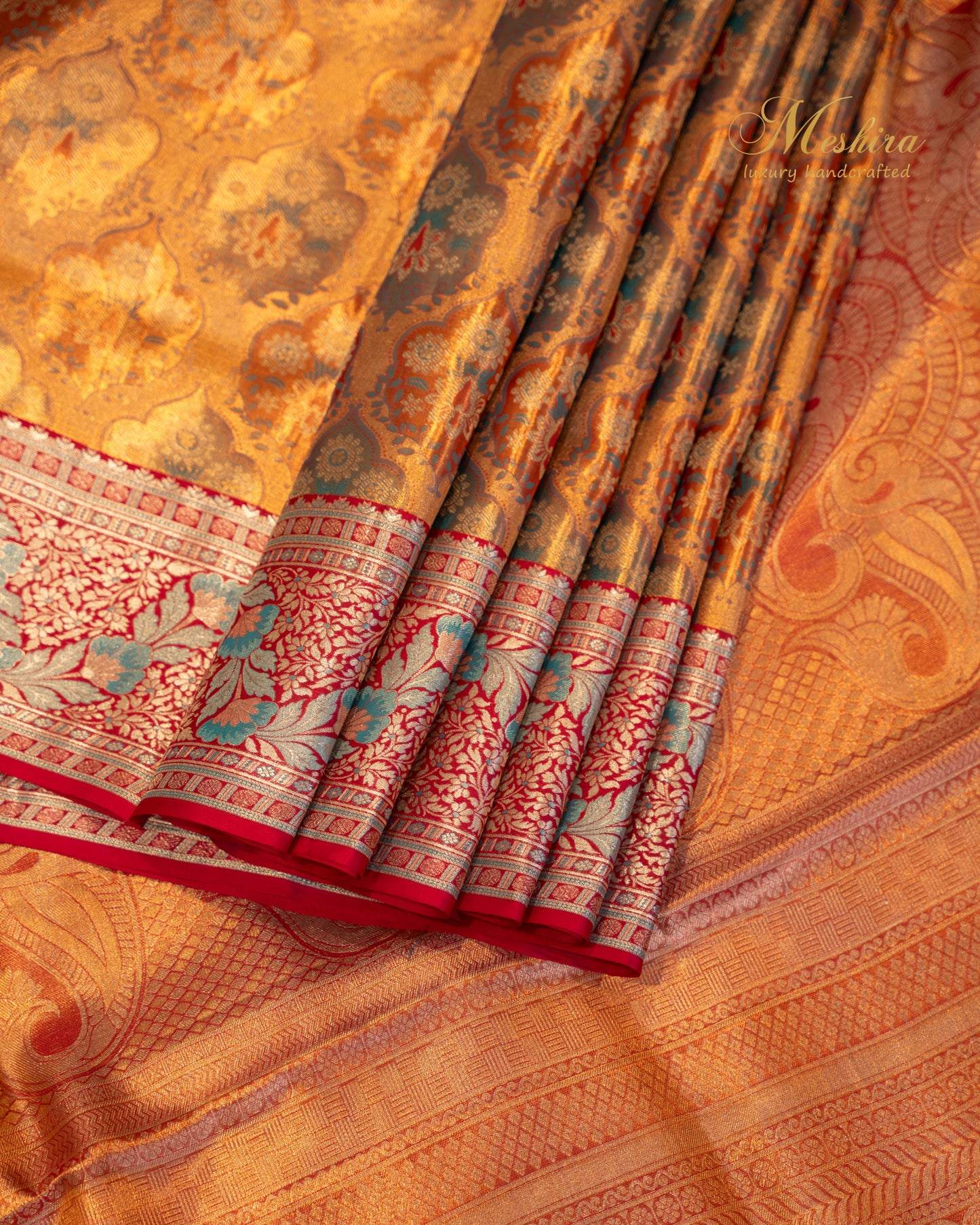 Copper-Orange Kanchivaram Silk Saree with pink Floral Zari Border