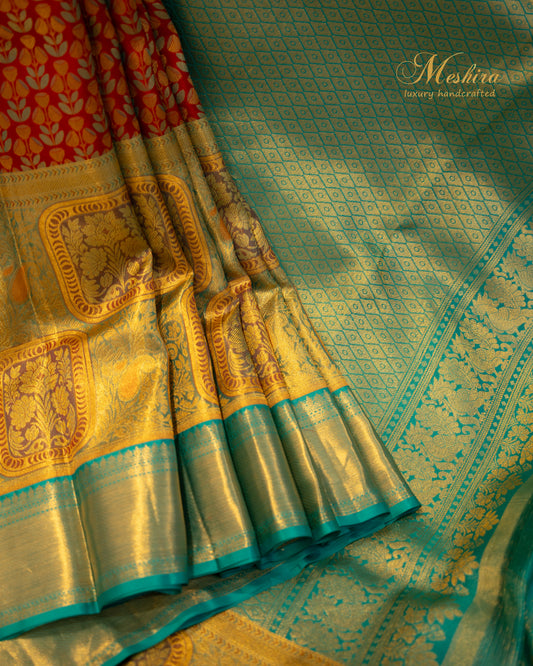 Graceful Teal Kanchivaram Silk Saree with Ruby Accents and Zari Shine