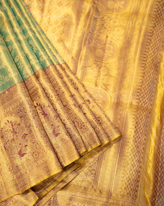 Heritage Green Kanchivaram Silk Saree Adorned with Antique Gold Zari