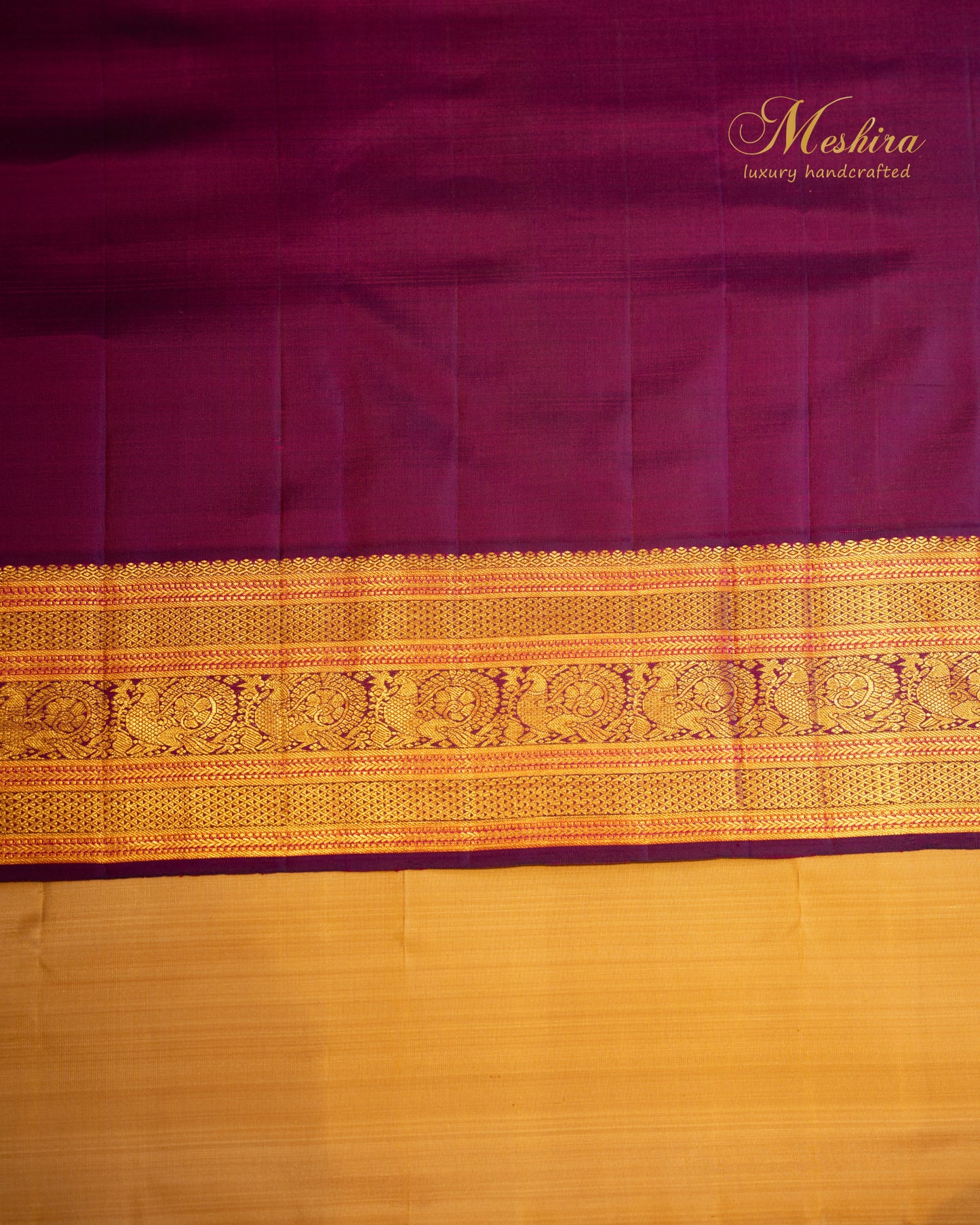 Mustard Beige Kanchivaram silk saree with Maroon Zari border.