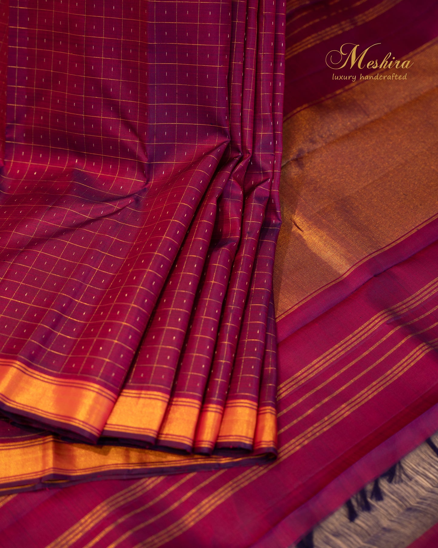 Elegant Purple Kanchivaram silk saree Draped in Burnt Orange Zari