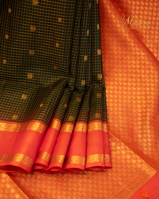 Radiant green Kanchivaram Silk Saree with a Striking Fiery Orange Pallu