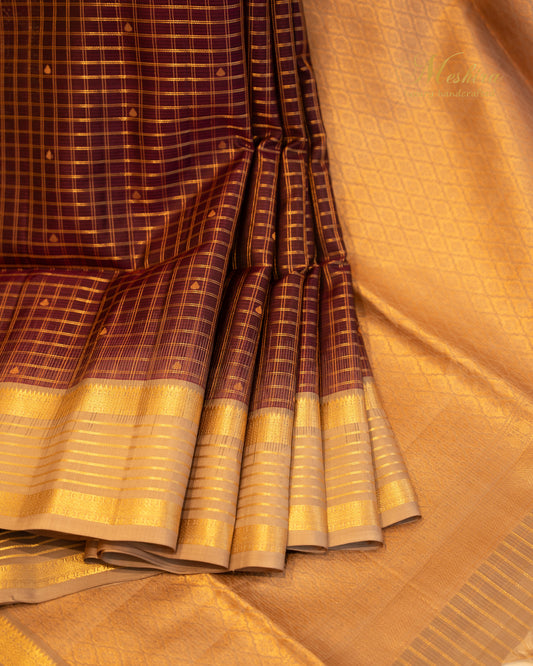 Majestic Maroon Kanchivaram silk saree with Peach-Gold Elegance