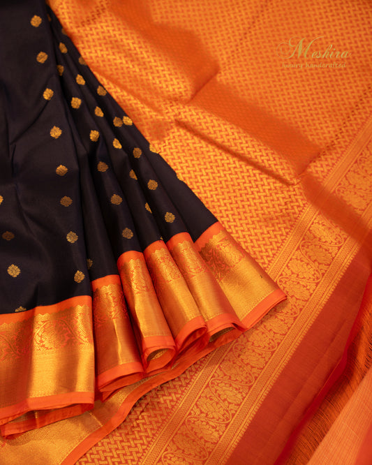 Ink blue Kanchivaram with Gold Buttas and Burnt Orange Brilliance