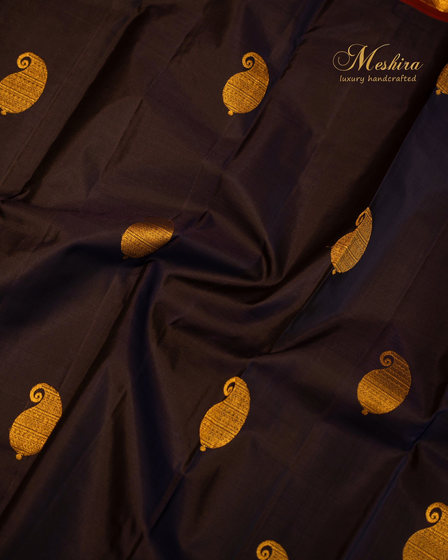 Royal blue Kanchivaram silk saree with gold zari and maroon edge