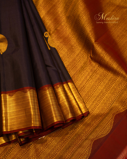 Royal blue Kanchivaram silk saree with gold zari and maroon edge