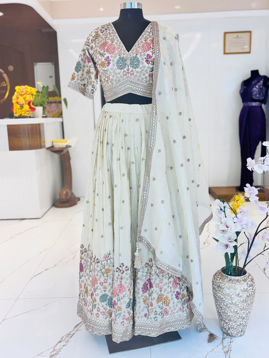 A dreamy lehenga adorned with delicate floral embroidery.