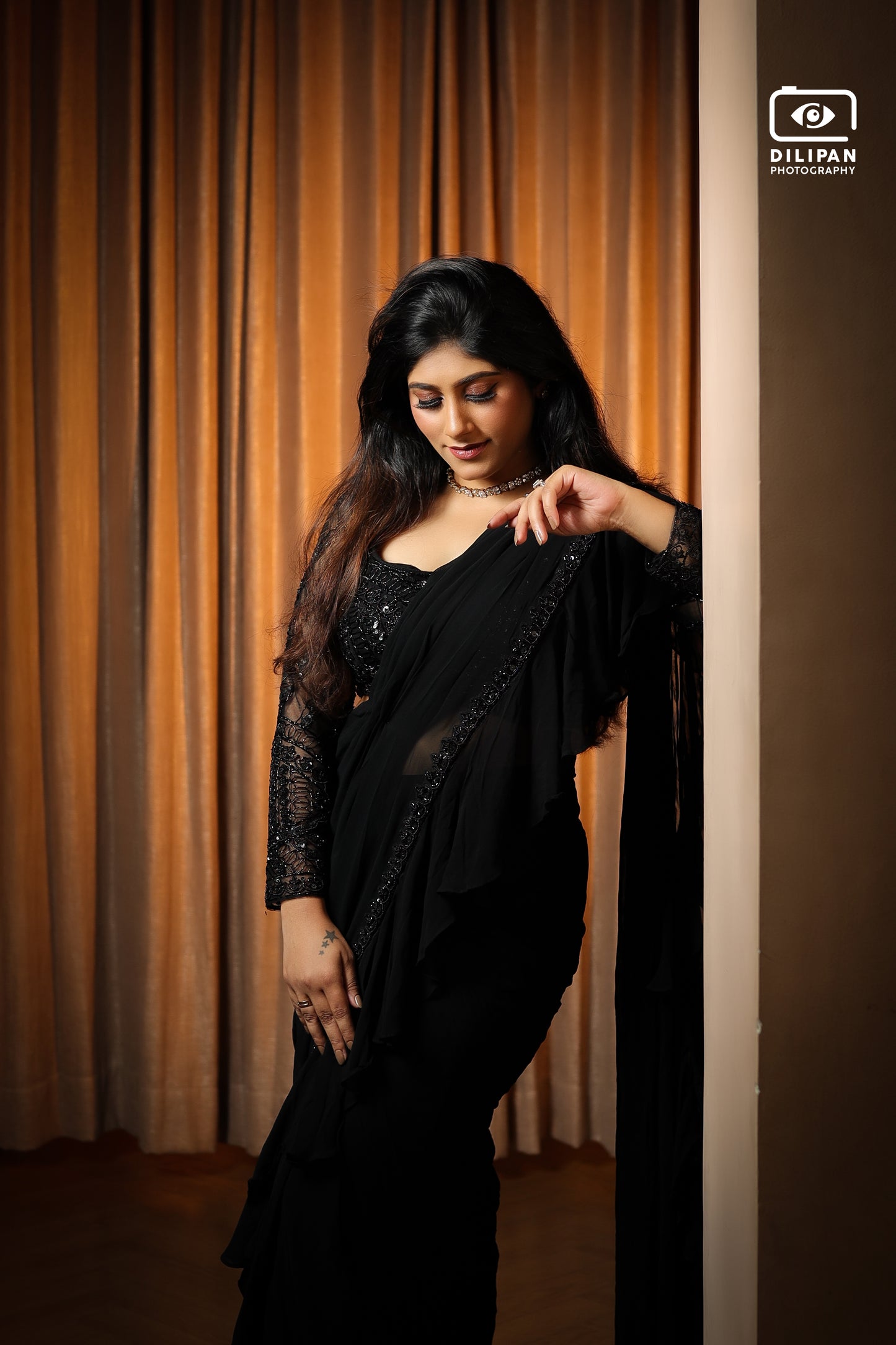 Black designer saree with embellished blouse