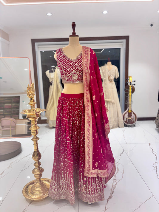 Red designer lehenga from Meshira