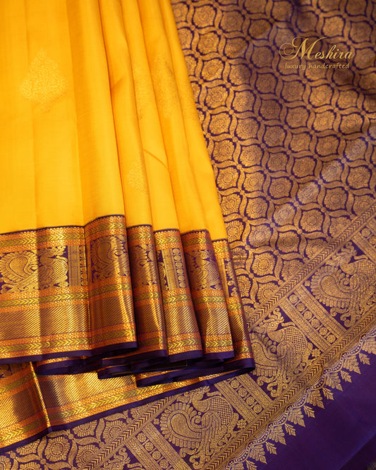 Sunshine yellow with royal purpose Kanchivaram silk saree.