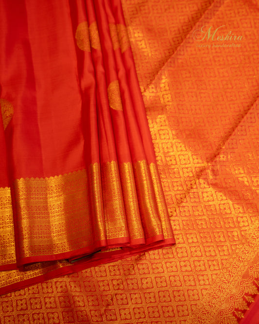 Vermillion red with gold butta Kanchivaram silk saree