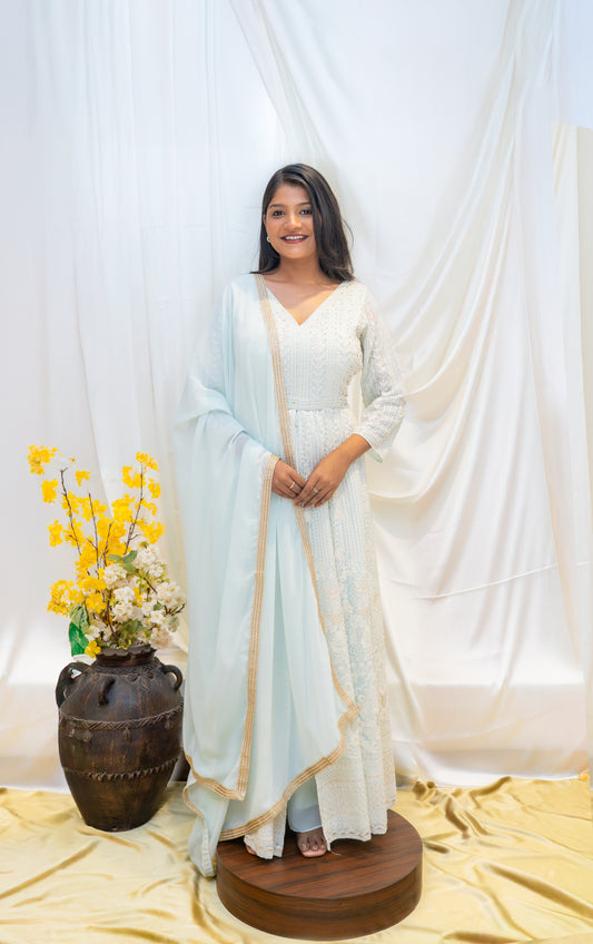 A serene ivory Anarkali adorned with delicate embroidery