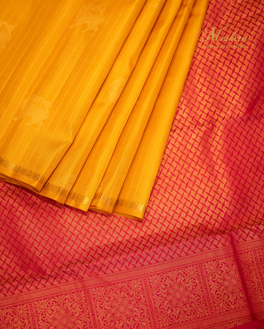 Borderless Kanchivaram Silk Saree in yellow and red with golden zari.