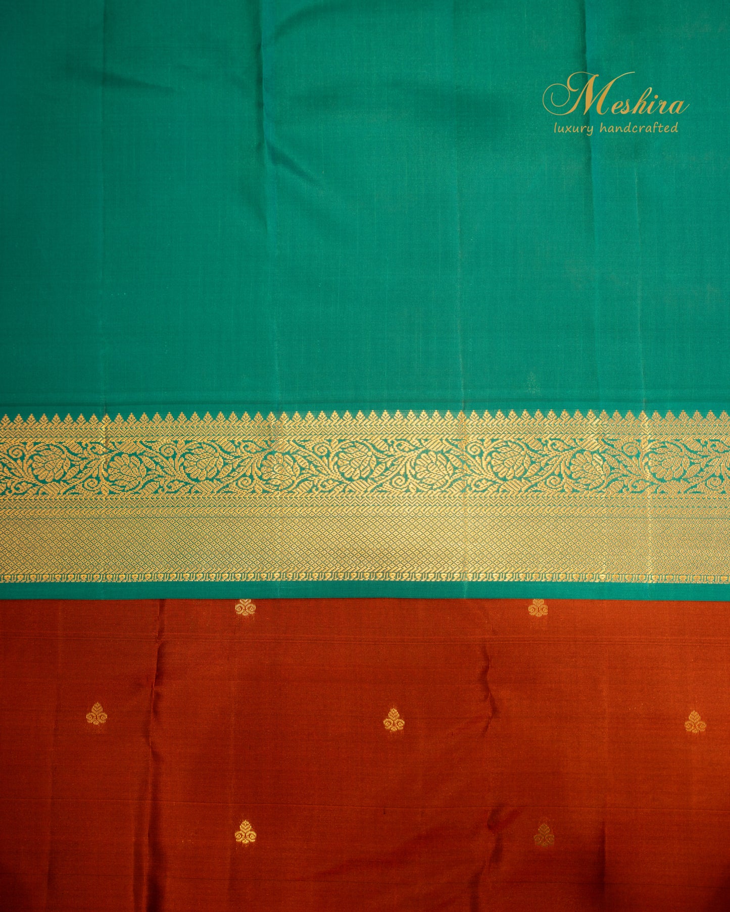 Rust & Sea Green Kanchivaram silk saree with golden buttas