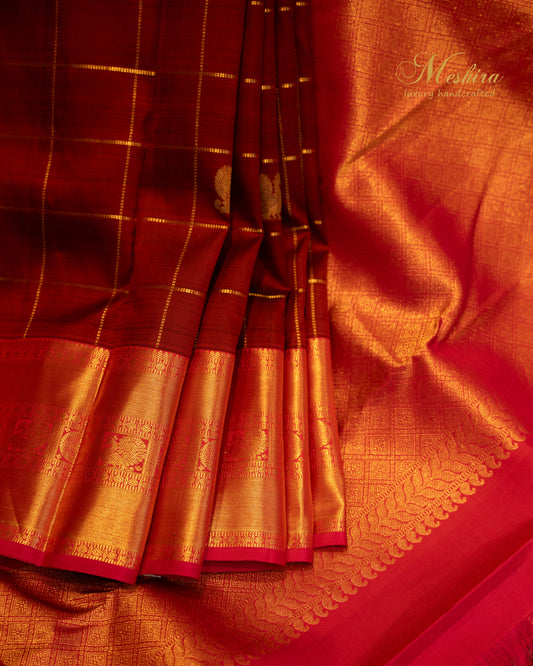 Maroon Kanchivaram Silk Saree with golden Zari in Bhavaji Border