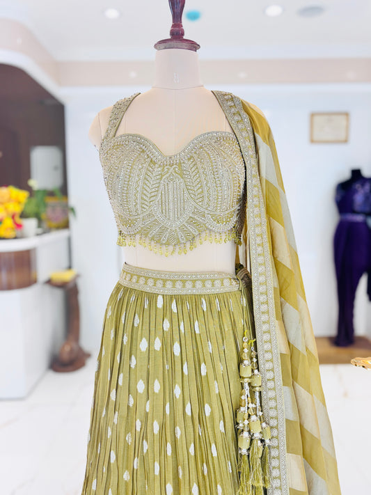 Elaichi green flowy Lehenga from Meshira.