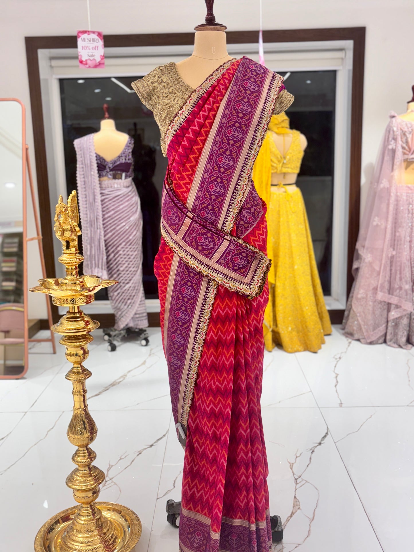 Pink Pattola Silk Saree with embroidery.