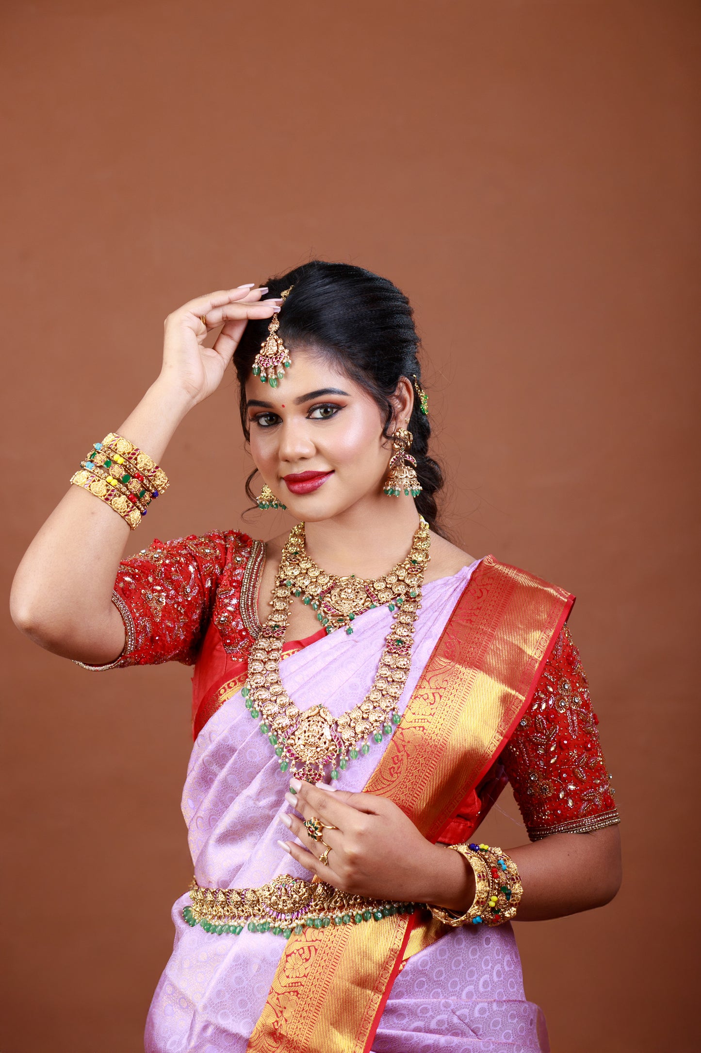 Lavender silk saree with intricate zari and  red colour border