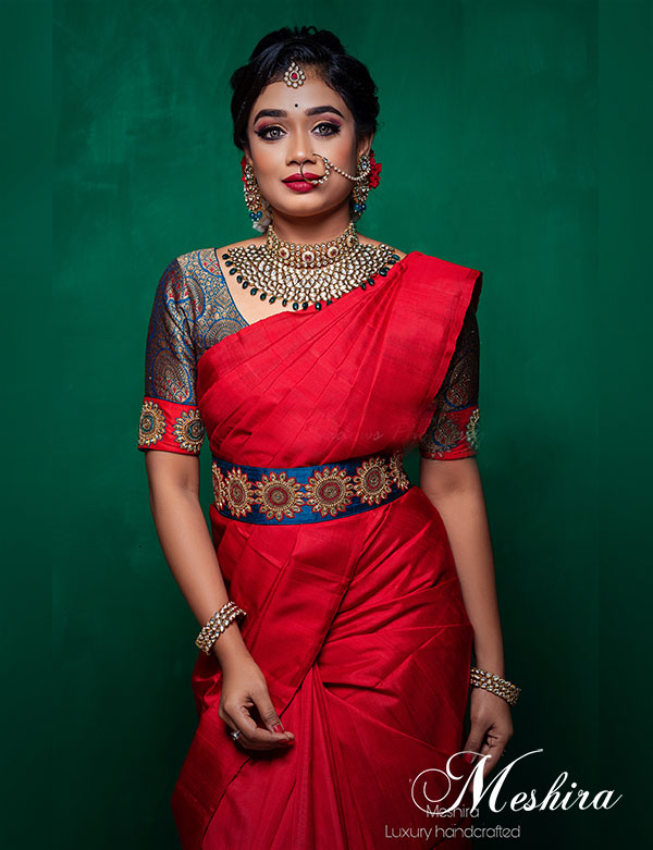 Crimson red silk saree in borderless trend and elegantly paired with a ...