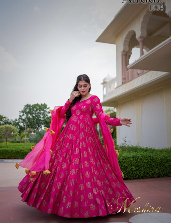 Rani pink Bandhej style and flaired gown with designer dupatta. – Meshira